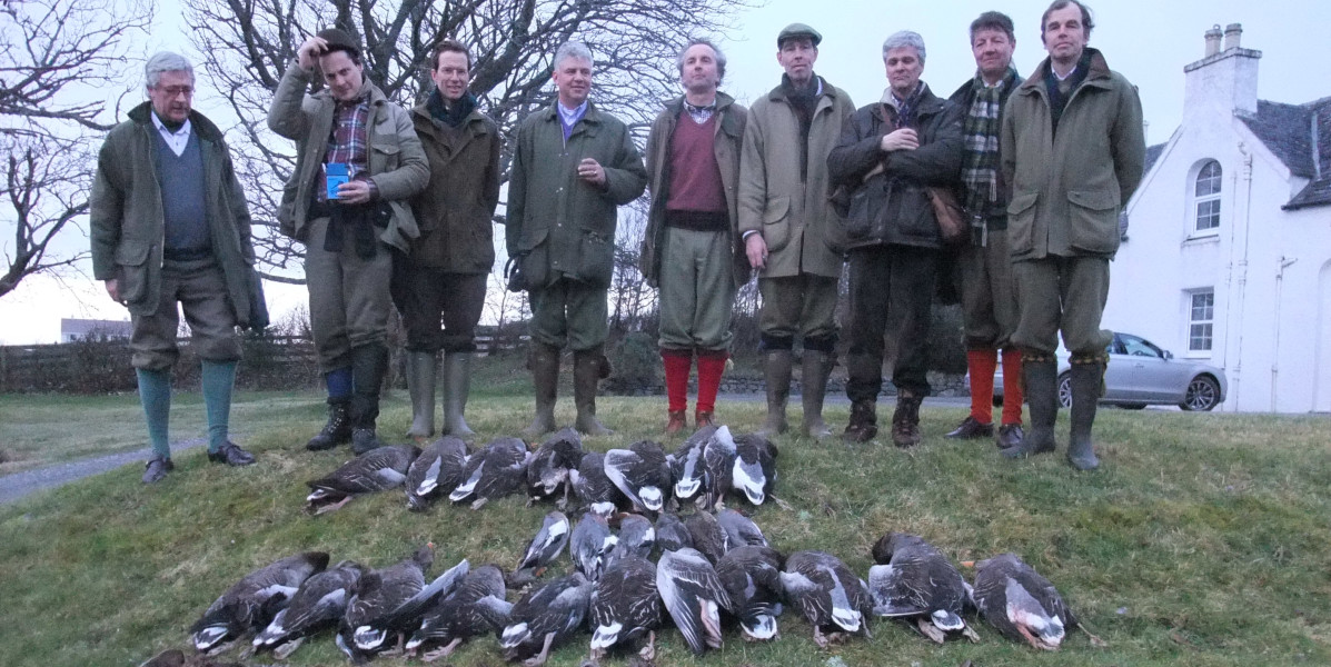 team of guns with mixed bag woodcock and geese