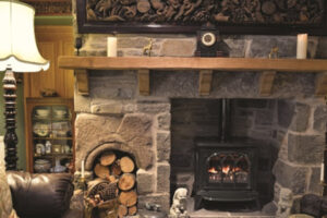 lounge with log store and wood burner