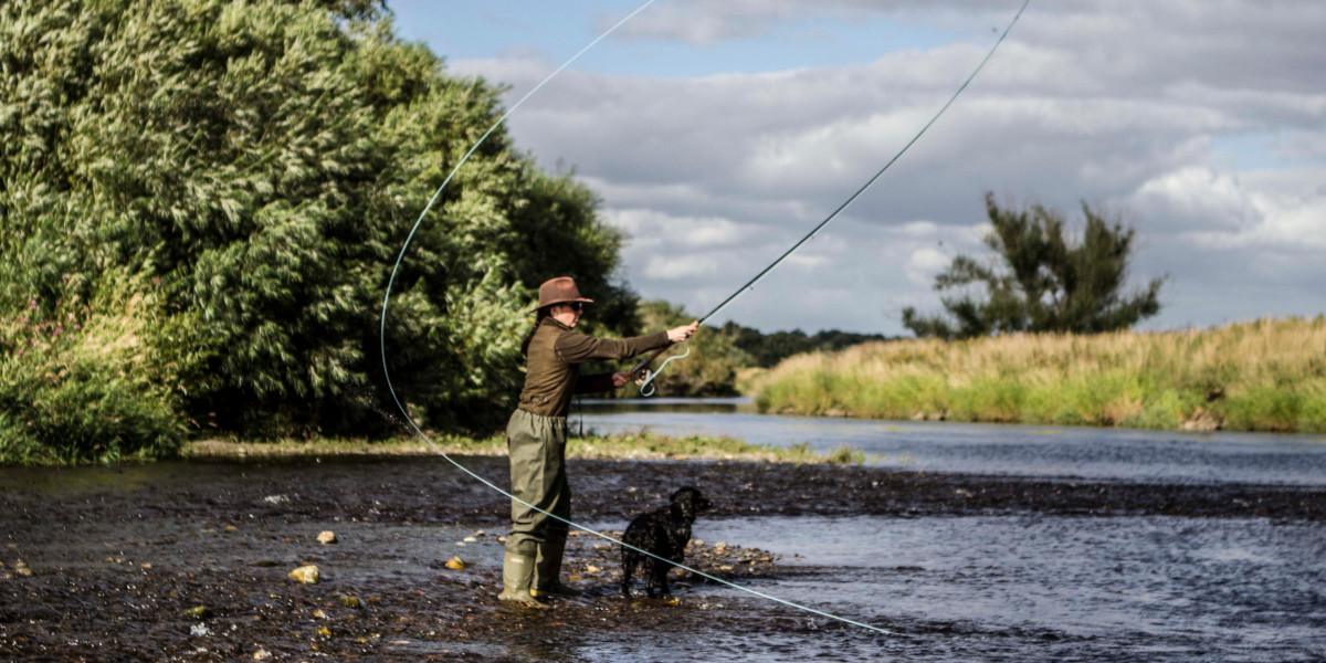 girl fishing and black dog