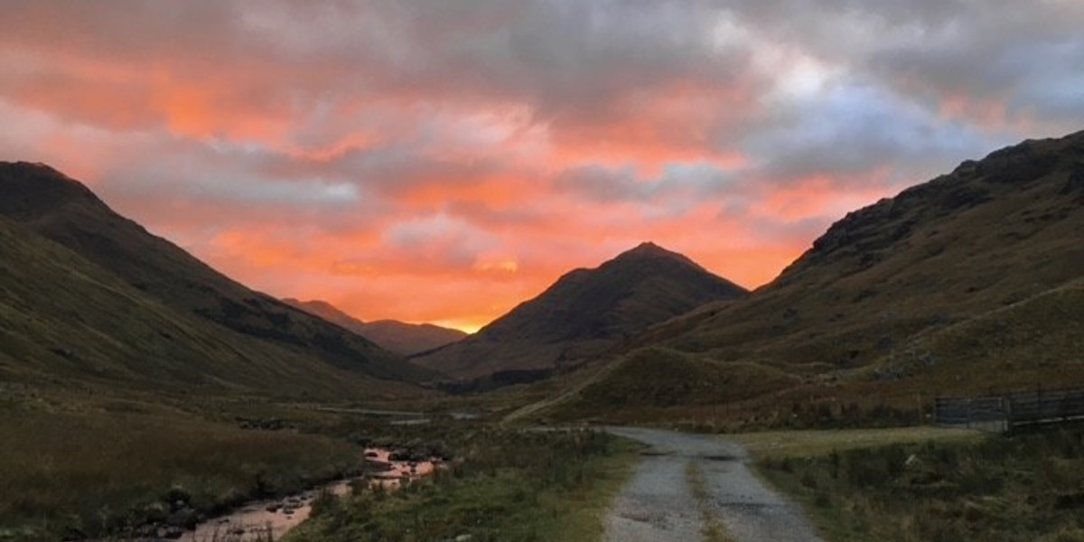 Sunset behind Scottish mountains