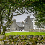 South uist Lodge through trees 150x150